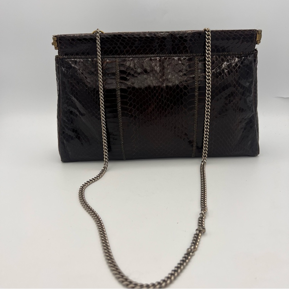 vintage brown snakeskin clutch bag with a detachable chain strap hinged clasp